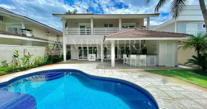 Casa no guarujá, condomínio fechado, jardim pernambuco, 5 quartos, 5 suítes, piscina e churraqueira  - mercuri imóveis - imobiliária guarujá
