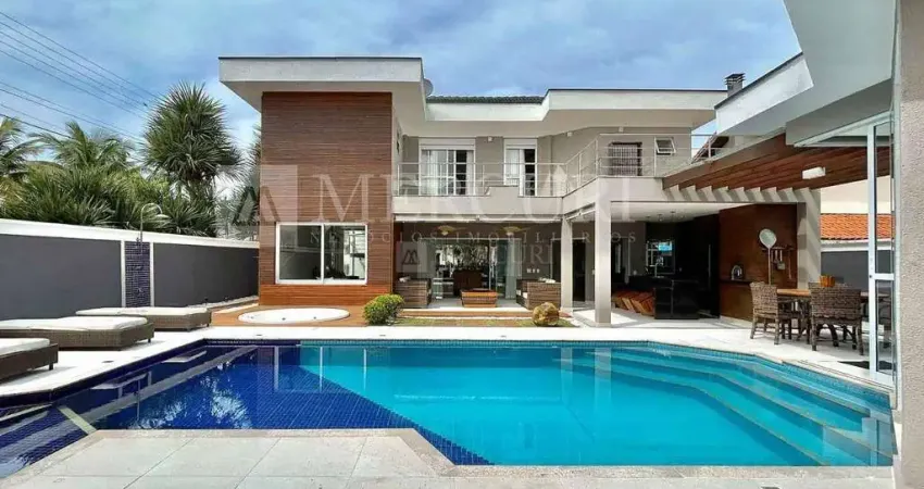 Casa no guarujá, jardim acapulco, condomínio fechado, 5 quartos, 5 suíte e sacada - mercuri imóveis – imobiliária no guarujá
