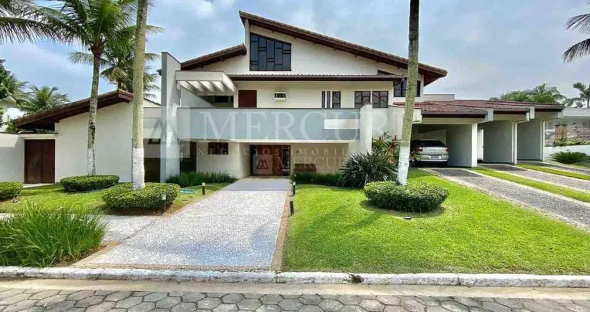 Luxuosa residência com 4 suítes e ampla área de lazer no condomínio jardim acapulco - mercuri imóveis - imobiliária no guarujá