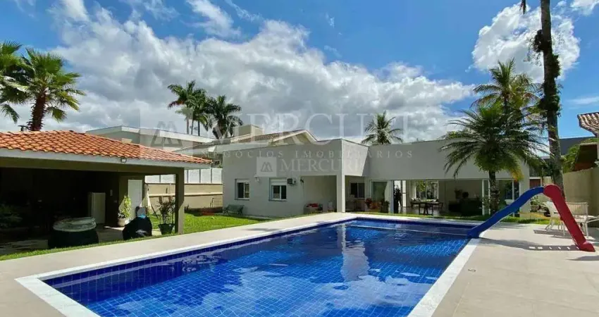 Residência de alto padrão com 4 quartos e piscina no condomínio jardim acapulco - mercuri imóveis - imobiliária no guarujá
