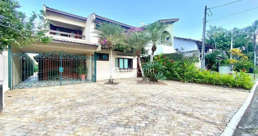 Casa no guarujá, balneário praia do pernambuco, 4 quartos, sendo suítes, espaço gourmet e piscina - mercuri imóveis - imobiliária no guarujá