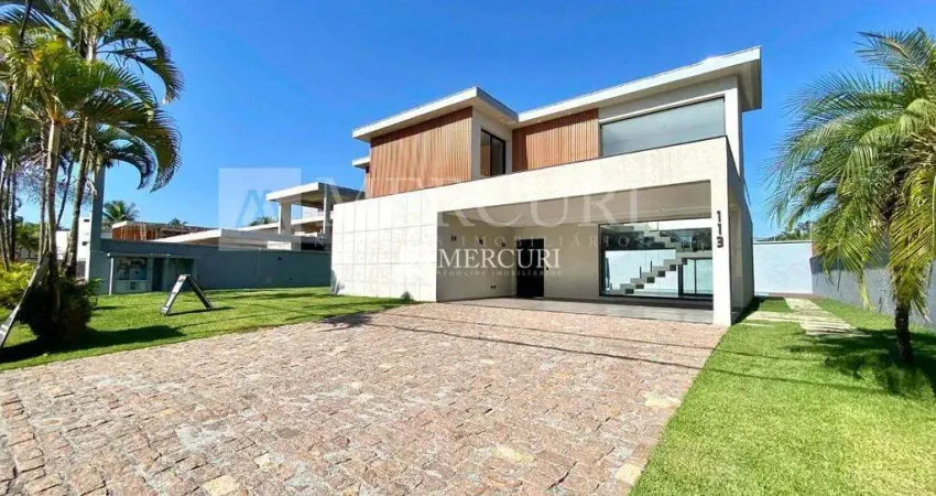 Casa no guarujá, condomínio fechado, 4 quartos, sendo 4 suítes, piscina com saúna e churrasqueira - mercuri imóveis - imobiliária no guarujá
