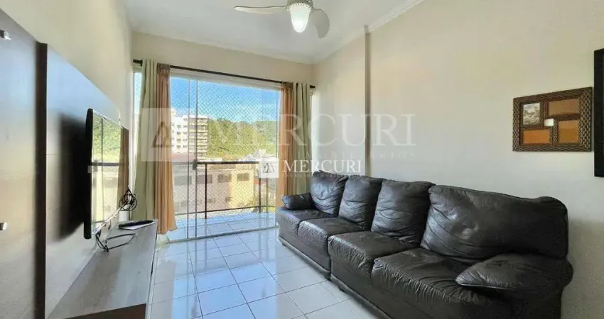 Apartamento no guarujá, enseada, 2 quartos e sacada com vista parcial do mar - mercuri imóveis - imobiliária no guarujá