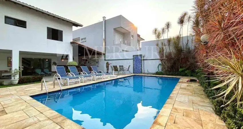 Casa no guarujá, jardim acapulco, condomínio fechado, 6 quartos, sendo 5 suíte e varanda gourmet - mercuri imóveis - imobiliária no guarujá