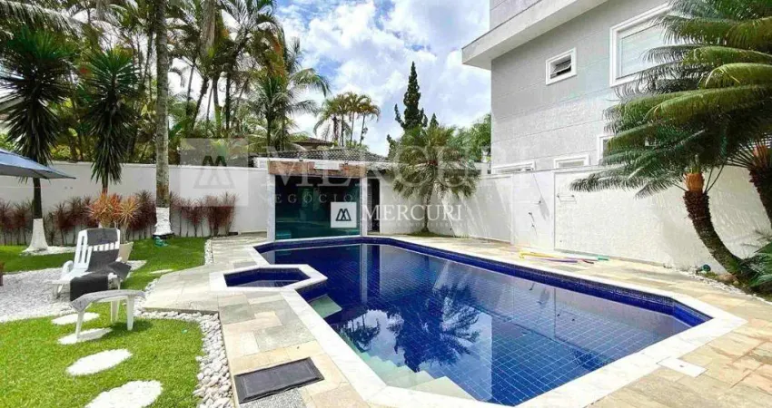 Casa no guarujá, jardim pernambuco, condomínio fechado, 4 quartos, sendo suítes e varanda gourmet - mercuri imóveis - imobiliária no guarujá