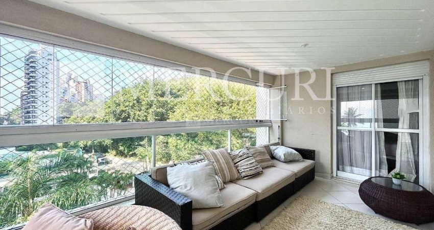 Apartamento no Guarujá, Astúrias, 3 suítes, varanda gourmet e vista parcial do mar.