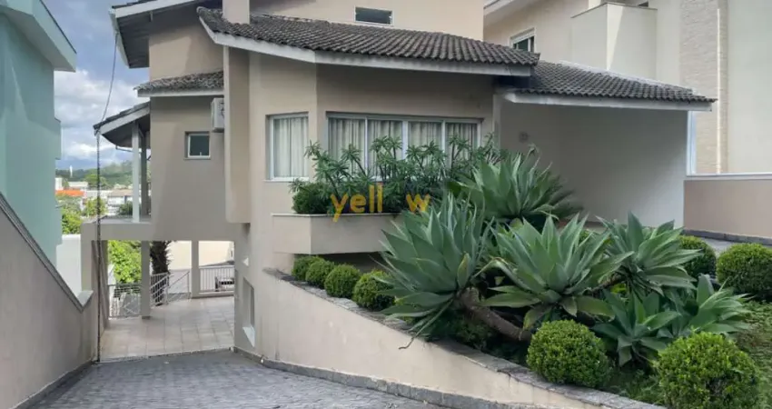 Casa em condomínio arujá 5 com 4 dormitórios e 3 suítes - aluguel por r$ 15.000.