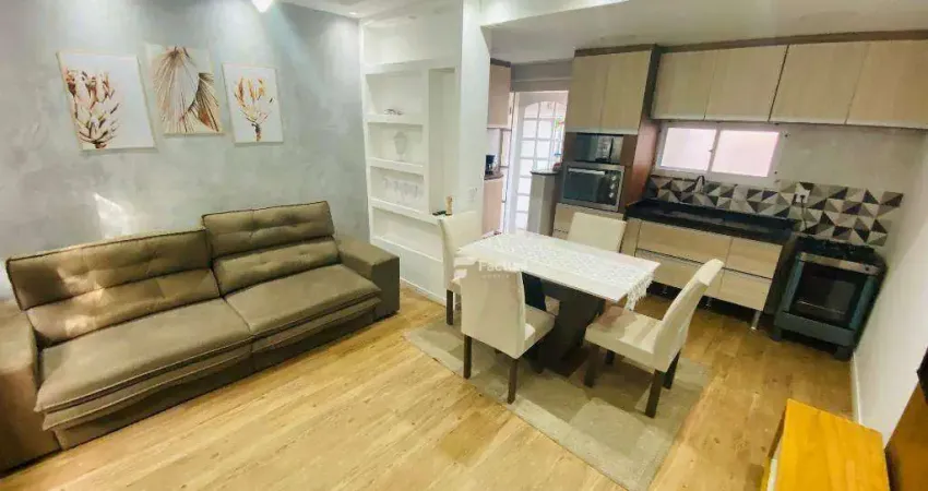 Village com 2 dormitórios à venda, 52 m² por R$ 298.000,00 - Enseada - Guarujá/SP