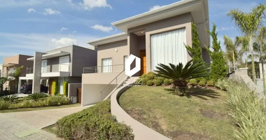 Casa em condômino com 6 suítes, área gourmet e 4 vagas de garagem!