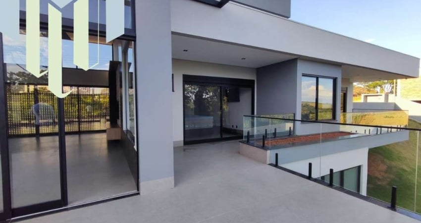 Casa á venda condomínio Portal da Serra com 04 suítes, escritório, toda automatizada ,vista para o vale, acabamento impecável.