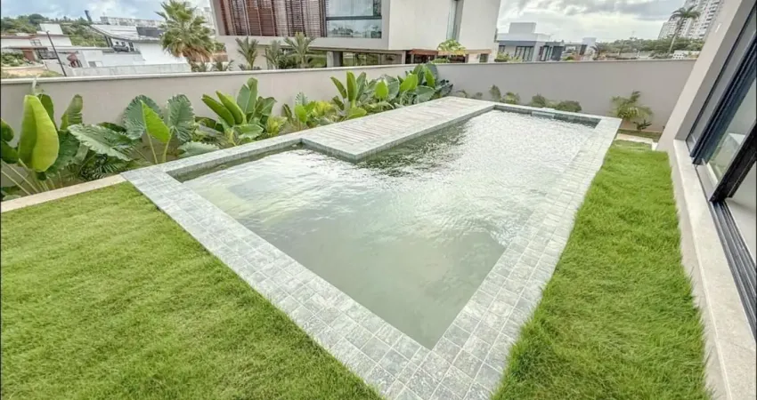 Linda casa em condomínio fechado com 392m²  4 suítes com piscina