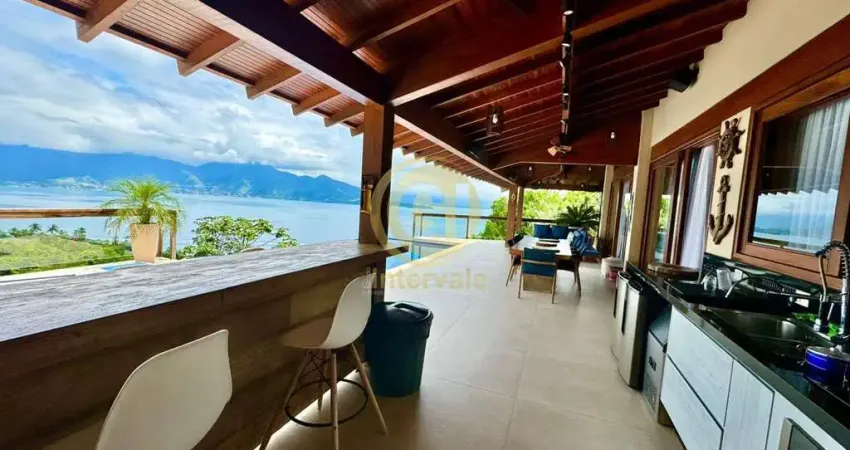 Casa nova mobiliada e decorada com vista extraordinária em condomínio - ilhabela sp