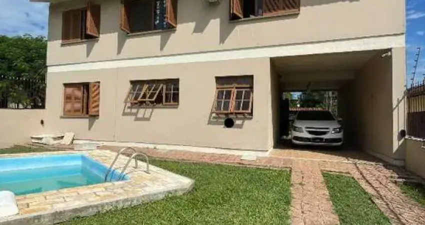 Casa com 4 quartos à venda na Rua Açores, 201, Tarumã, Viamão