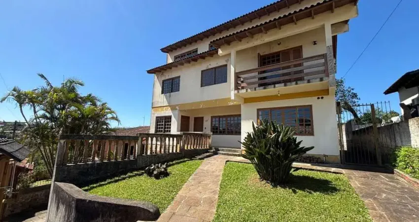Casa com 5 quartos à venda na Rua Flodoaldo de Souza Feijó, 827, Tarumã, Viamão