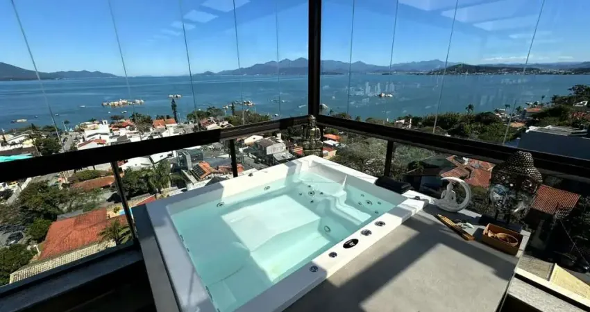 Vista mar, sacada com churrasqueira, terraço privativo com jacuzzi, 2 suítes e 2 vagas à venda em coqueiros.