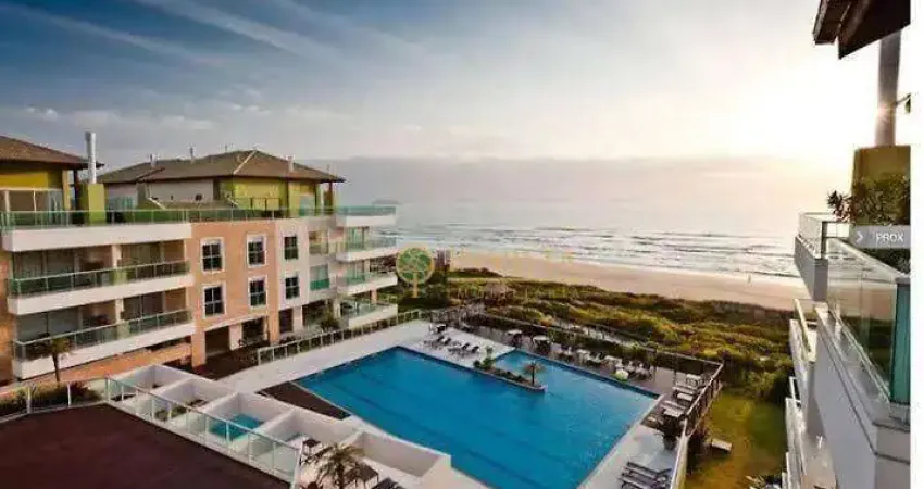 Frente mar à venda na praia do santinho! sacada com jacuzzi, semi mobiliado, 2 quartos e 1 vaga de garagem.