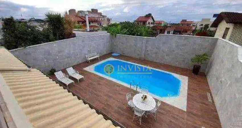 2 pavimentos, 4 quartos, sacada, piscina e 2 vagas de garagem - à venda no bairro carianos