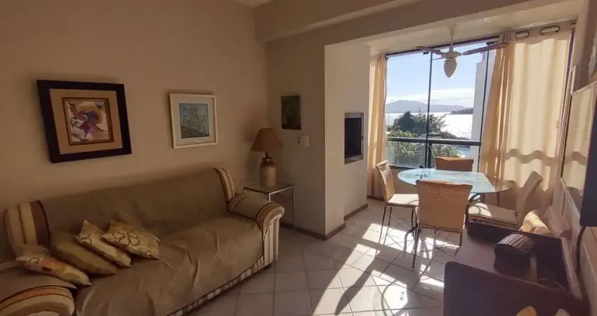 À venda | Pé na Areia, 63 m² 2 quartos, Sacada com churrasqueira e Vista Mar, 1 vaga de garagem - Praia de Canasvieiras, em Florianópolis.