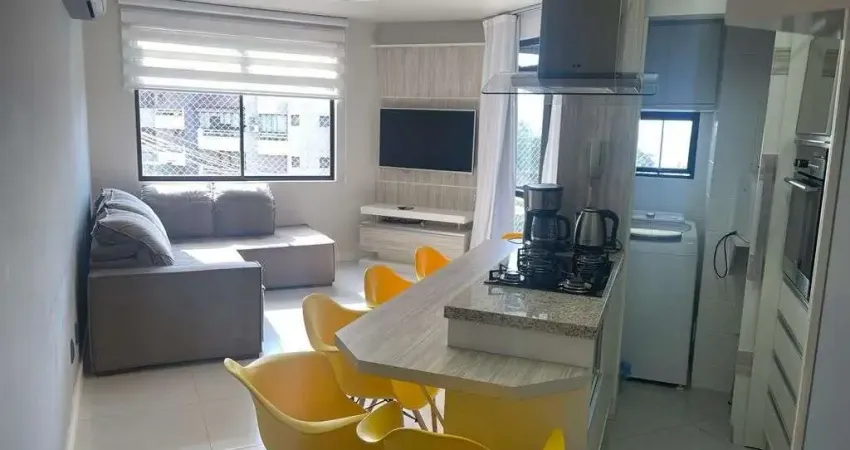 À venda | 75 m², próximo ao Mar, 2 quartos, sacada com churrasqueira e 1 vaga de garagem - Praia de Canasvieiras, em Florianópolis.