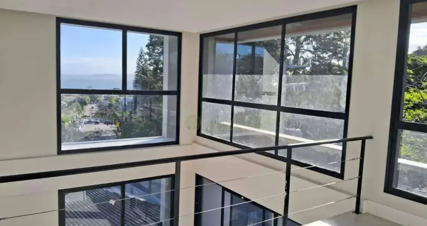 Apartamento loft com vista mar à venda em florianópolis, sacada com churrasqueira e 65 m² privativos - bairro santo antônio de lisboa.