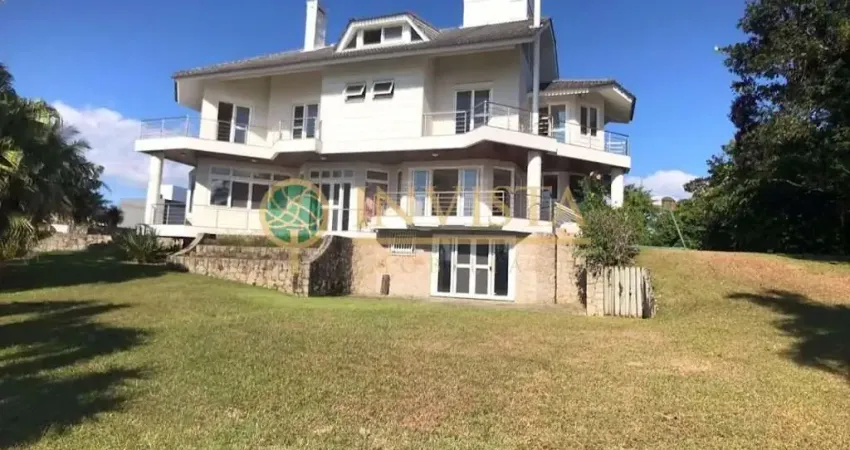 Alto padrão com vista mar, 4 suítes e dependência de empregada.