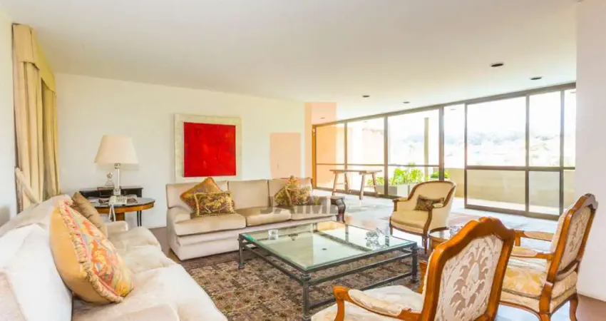 Residência com 4 suítes e 8 vagas com linguagem brutalista e vista para o vale do Pacaembu.