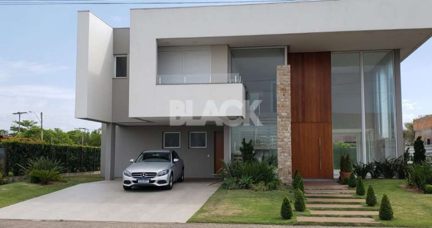 Casa de 5 suítes no Ocean Side em Torres RS