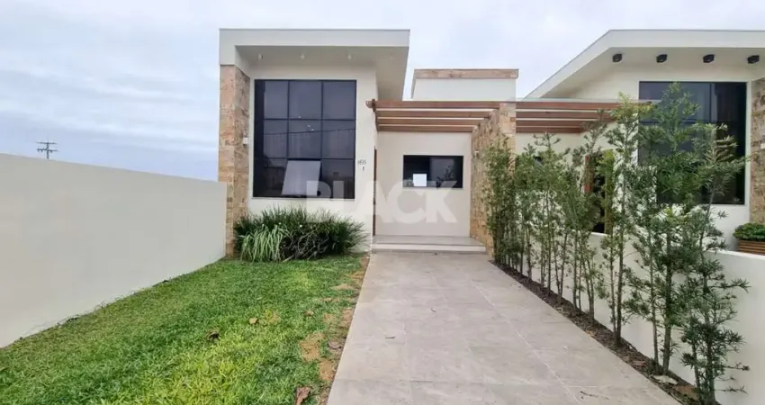Casa geminada térrea no Morada das Palmeiras em Torres RS