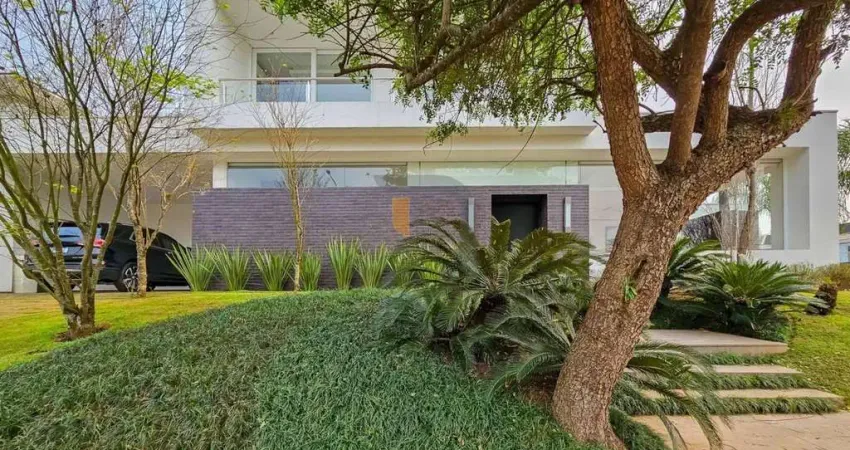 Casa mobiliada com 338m² com 3 suítes em terreno de 806m² - alphaville/gravataí