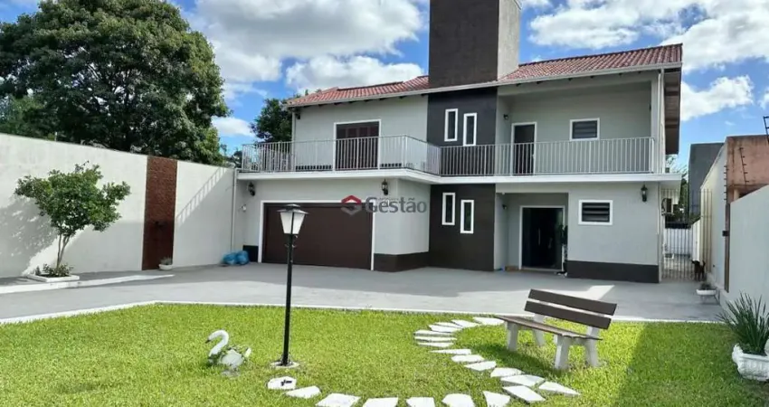 Belíssimo sobrado c/ 5 dormitórios (01 suíte c/ sacada) no centro de esteio