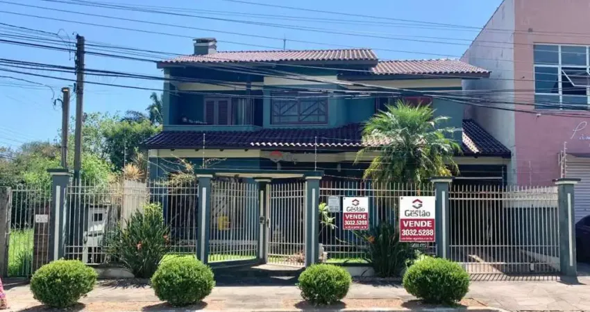 Casa com 4 quartos à venda na Rua Tenente Antônio João, 228, Loteamento Bela Vista, Canoas