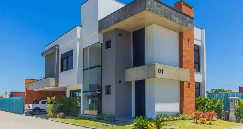 vende sobrado novo em condomínio com 3 suítes em Canoas.