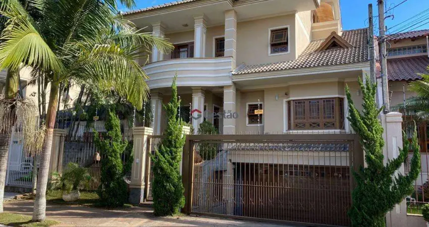 Casa com 4 quartos à venda na Rua das Bromélias, 240, Estância Velha, Canoas