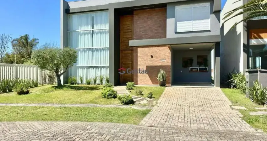 Sobrado mobiliado e decorado em condomínio fechado c/04 quartos (04 suítes) em capão da canoa/rs