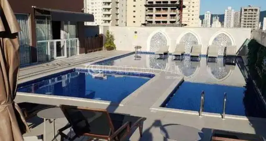 Apartamento mobiliado com 3 suítes, 3 vagas e lazer completo em meia praia