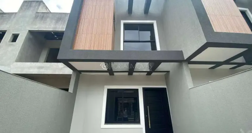 Sobrado de 2 suítes com churrasqueira e acabamento de alto padrão em porto belo