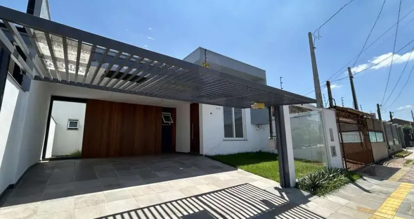 Casa nova e moderna no bairro igara em canoas - pé direito alto - porcelanato - churrasqueira - vaga de garagem coberta para 2 carros.