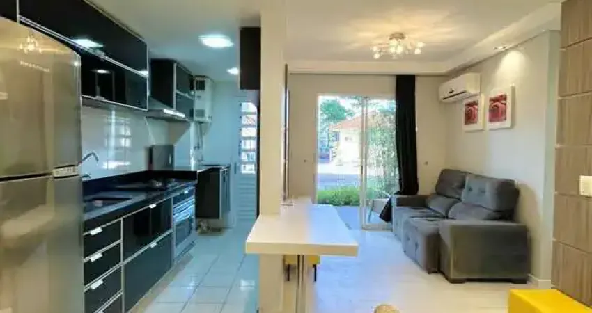 Apartamento com pátio , 2 dormitórios bairro igara em canoas - rs