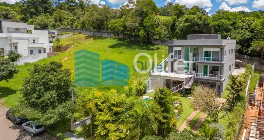 Linda casa em condomínio fechado na cidade de vinhedo, 698 m² área construída, 1450,00 m² de terreno, 5 dormitórios sendo 2 suítes, living 4 ambientes, 4 banheiros, 6 vagas de garagem cobertas, pisci