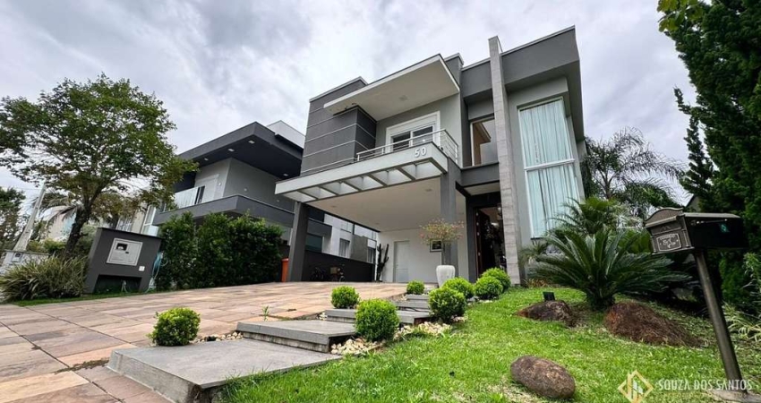 CASA COM 4 SUÍTES MOBILIADA E DECORADA NO CONDOMÍNIO ALPHAVILLE EM GRAVATAÍ/RS