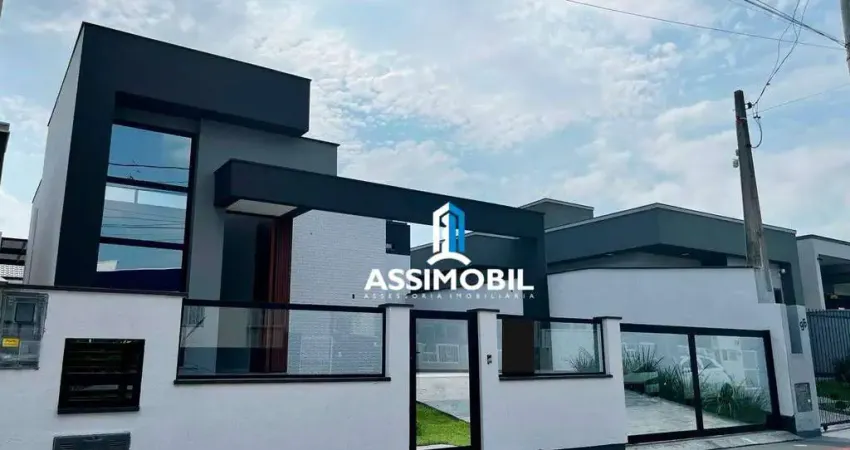 Casa com 3 dormitórios à venda, 112 m² por R$ 665.000,00 - Caminho Novo - Palhoça/SC
