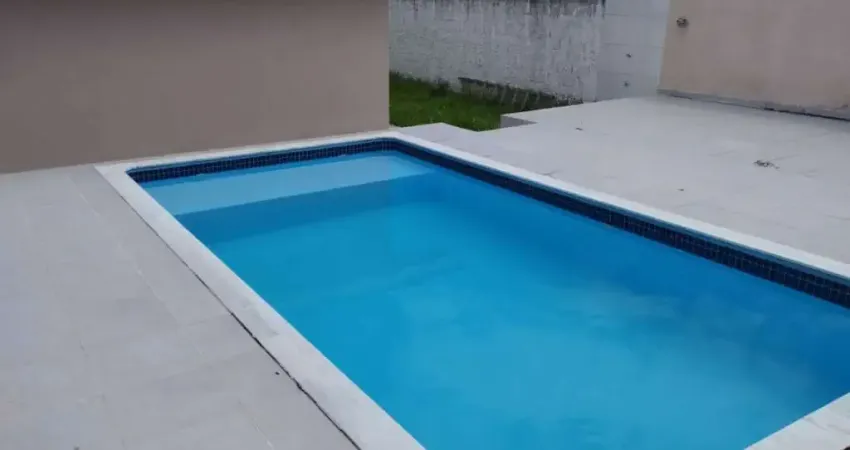 Casa com 3 dormitórios à venda, 180 m² por R$ 690.000,00 - Pontal de Santa Marina - Caraguatatuba/SP