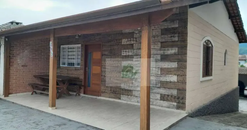 Casa com 3 dormitórios à venda, 140 m² por R$ 580.000,00 - Massaguaçu - Caraguatatuba/SP