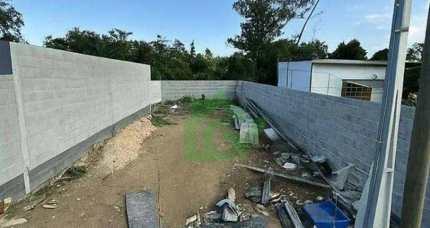 Terreno documentado à venda, 156 m² por R$ 120.000 - Balneário dos Golfinhos - Caraguatatuba/SP