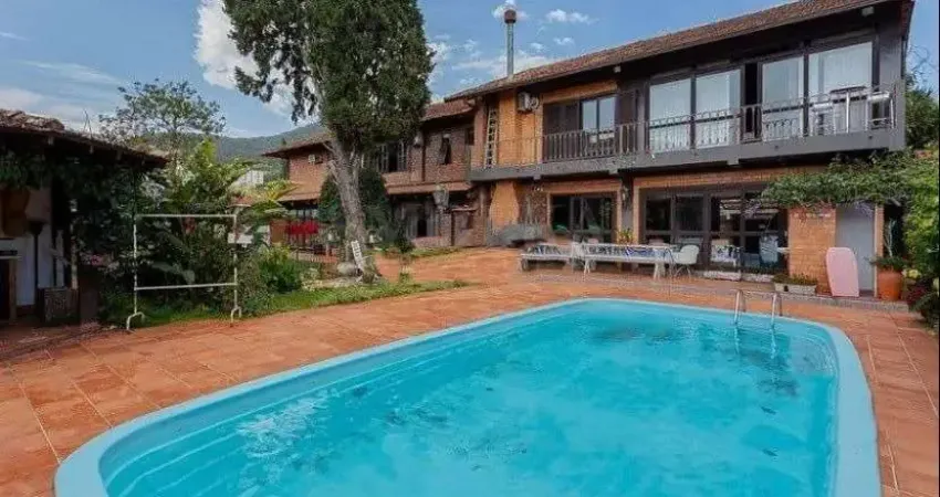 Casa em condomínio fechado com 5 quartos à venda na Rua Itapeva, Itacorubi, Florianópolis