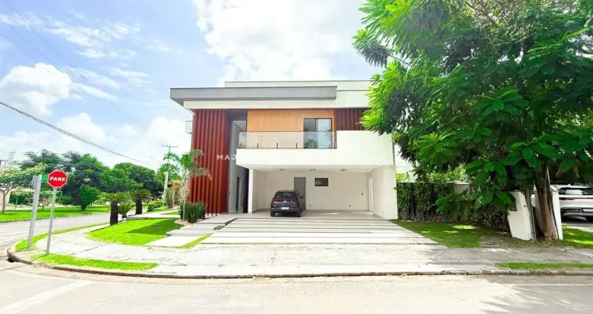 Casa com 5 suítes e vista parcial para o mar no alphaville araçagy