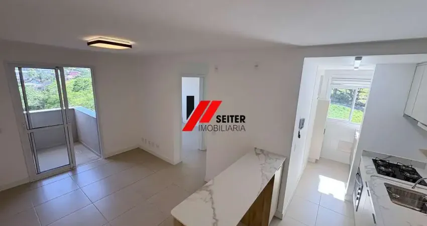 Apartamento de 2 dormitórios com suite para alugar florianopolis