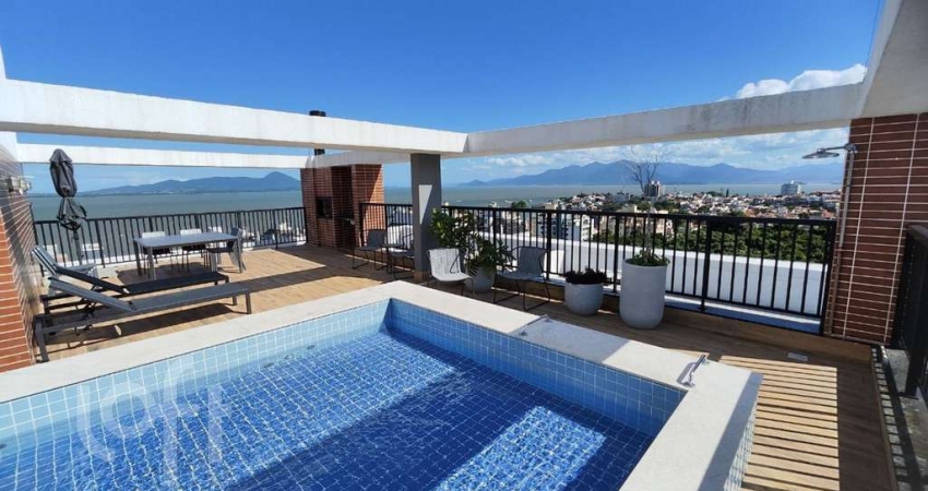 Apartamento à venda em Coqueiros com 83 m², 2 quar