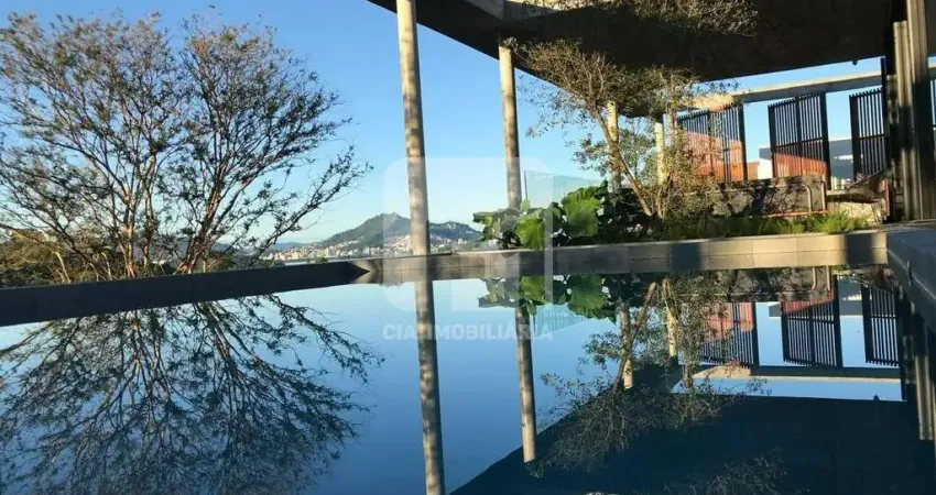 Casa em condomínio fechado com 3 quartos à venda na Rodovia Haroldo Soares Glavan, 1830, Cacupé, Florianópolis