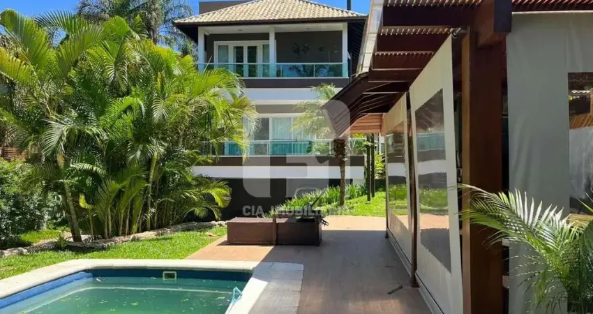 Casa em condomínio fechado com 4 quartos à venda na Rodovia Jornalista Manoel de Menezes, 961, Barra da Lagoa, Florianópolis